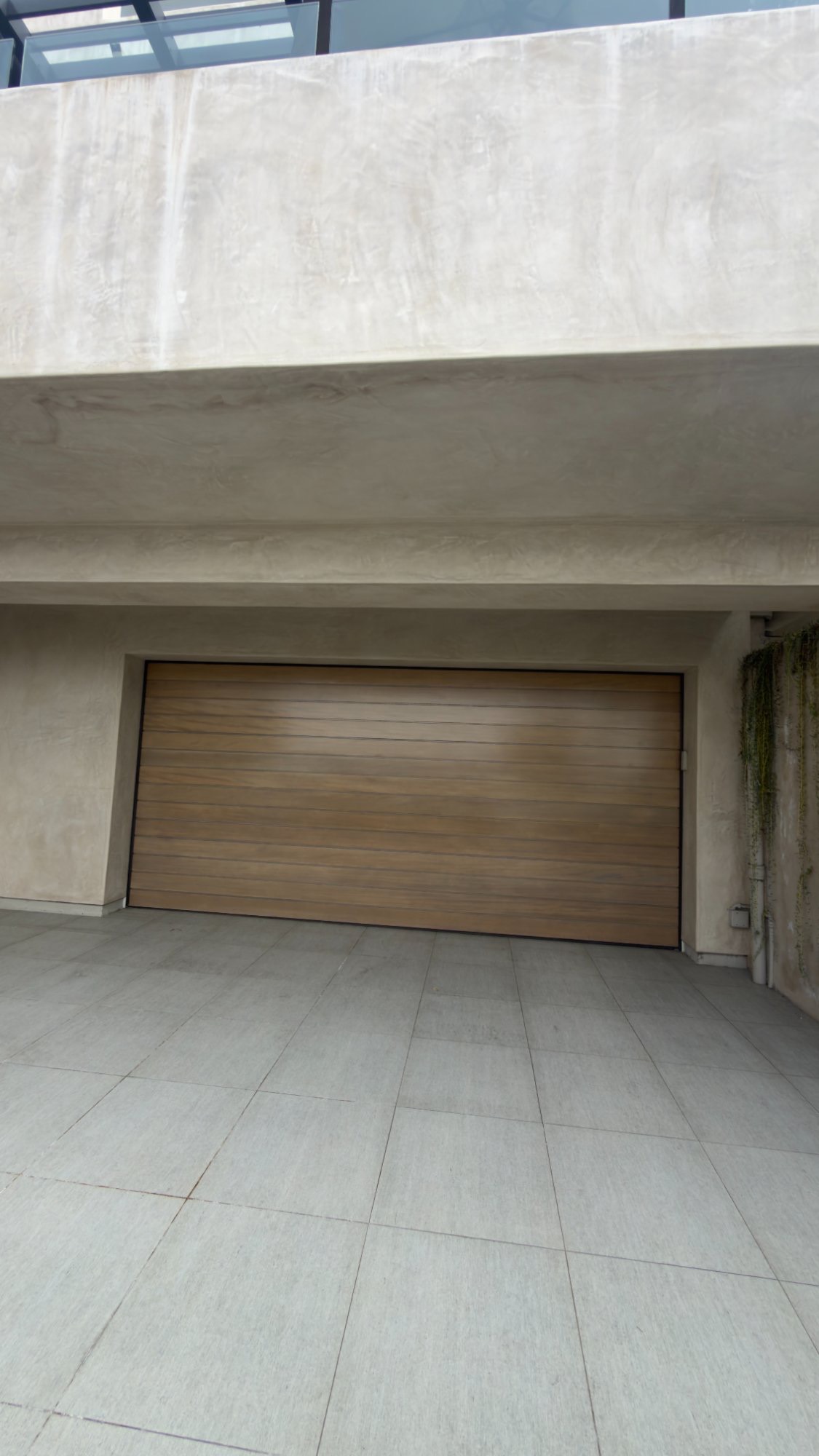 Garage door repair technician at work near Laguna Niguel CA