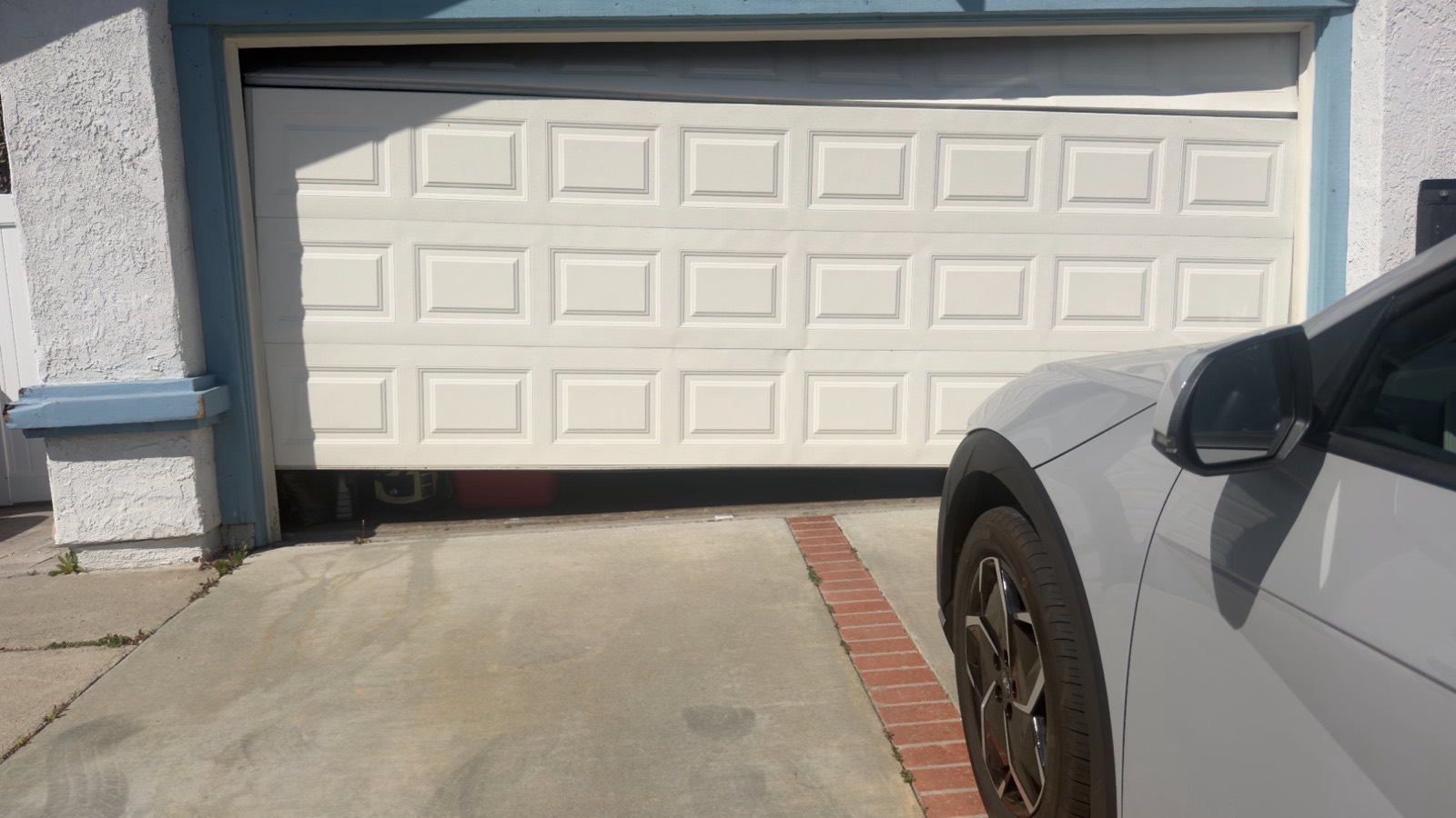 Off-track garage door repaired in Mission Viejo CA